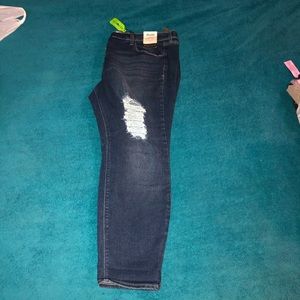 Dark wash distressed skinny stretch jean